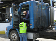 another inspector inspecting a truck  